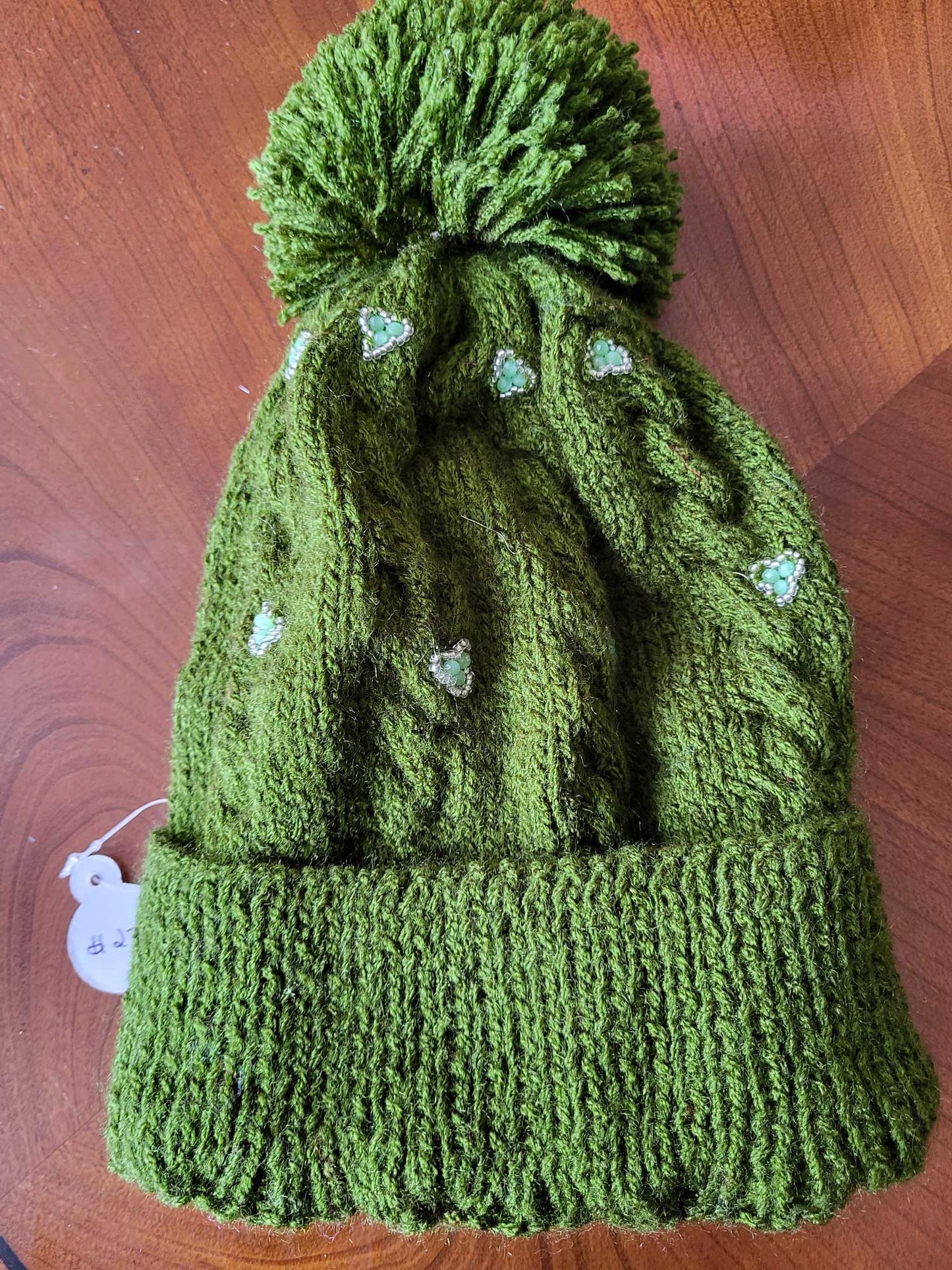 Pom pom embellished hats