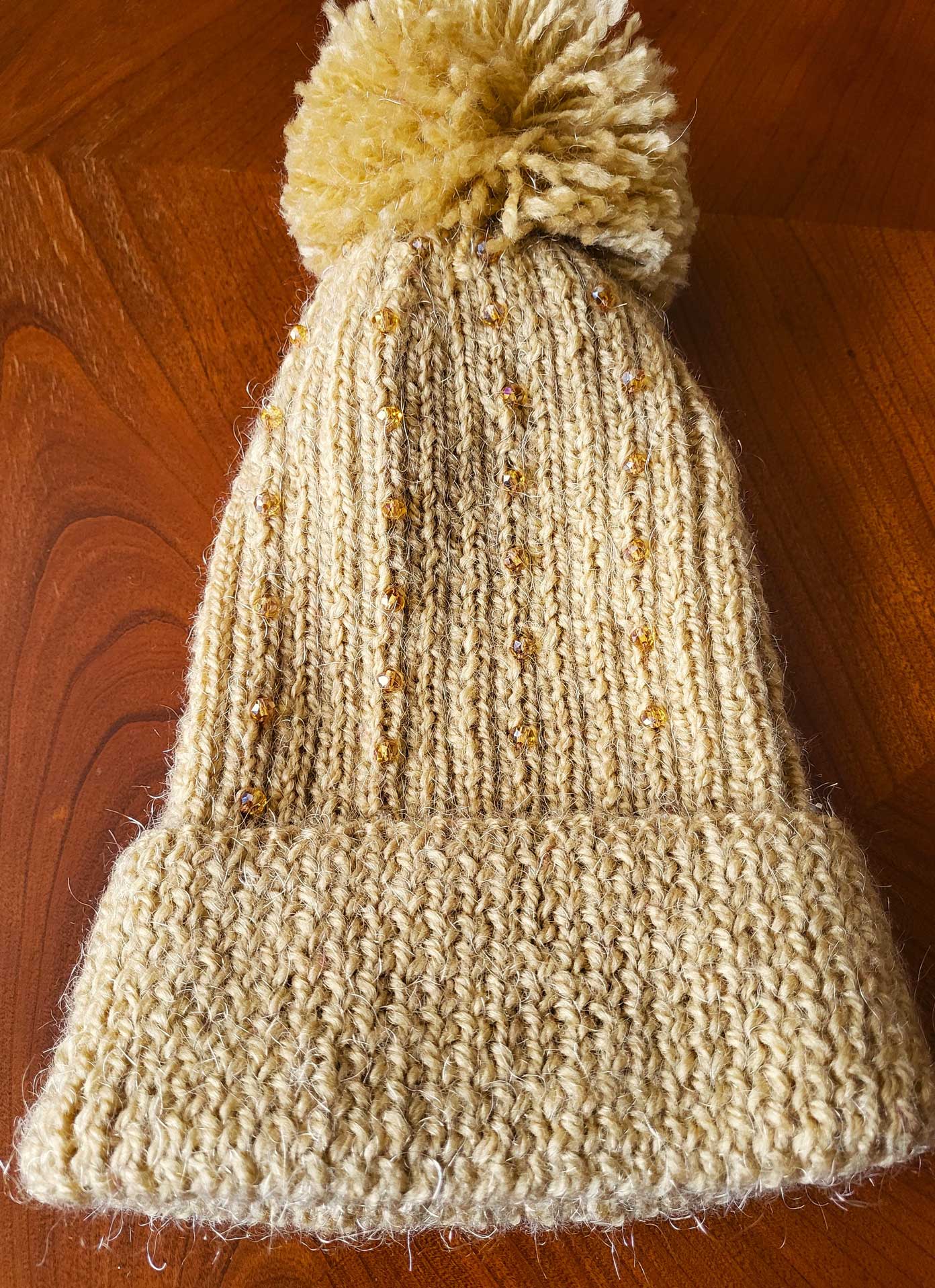 Pom pom embellished hats